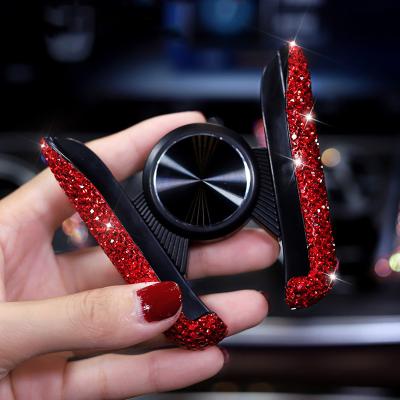 China Diamond Car Trinket Gravity Phone Steady Holder Auto Air Vent Phone Holder Diamond Car Trinket Gravity Phone Holder for sale