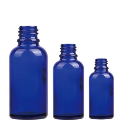 China Pharmaceutical Stock Amber Blue Green Glass Essential Oil Bottle For Cosmetic Packaging for sale