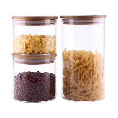 China Wholesale empty glass CANDY tea food /candy /spice storage jar with cork/wooden lid for sale