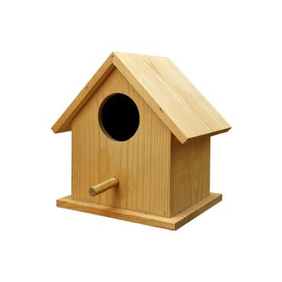 China 2022 Hot Selling Decorative Wooden Bird Nest House Handmade Bird House Breathable Wooden Carved Bird Cage for sale