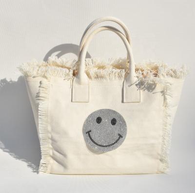 China ENGLAND STYLE Latest Fix Rhinestone Smile Design Large White Tassel Fringe Cotton Canvas Beach Tote Bag for sale