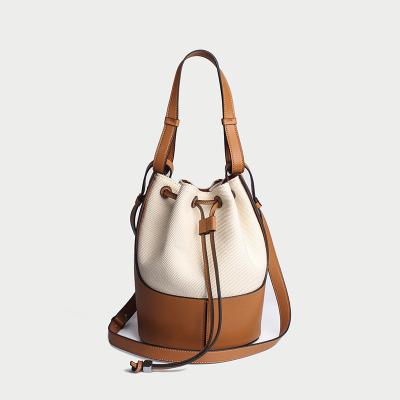 China ENGLAND STYLE Women Fashion PU Leather Drawstring Canvas Tote Bag Bucket Bags for sale