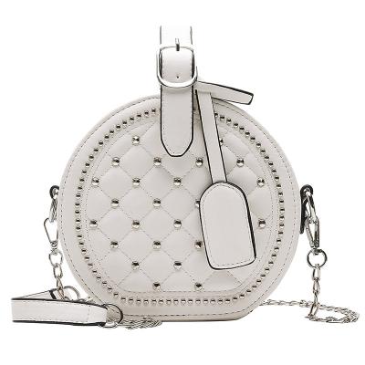 China High Quallity New female versatile shoulder bag rhomboid rivet small round bag cross-body bag for sale