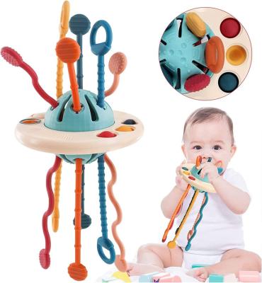 China Hot Selling Early Education UFO Food Grade Silicone Pull String Activity Toy Baby Sensory Toys For Baby for sale