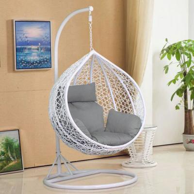 China Modern Hanging Chair With Round Frame Rattan Egg Garden Rattan Swing Hanging Chair for sale