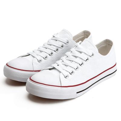 China CUSHIONING wholesale low cut vulcanized sneakers simple flat black white bulk white canvas shoes women for sale