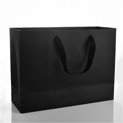 China Recyclable Wholesale Custom Shape Exquisite Luxury Black Paper Packaging Gift Box With Ribbon for sale