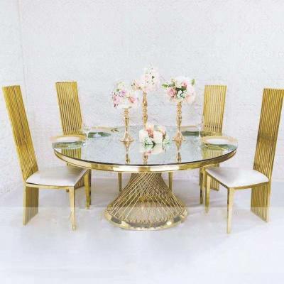 China Luxury Royal Contemporary High Back Round Table Set Design King Chair Gold Metal Stainless Steel King Dining Set for sale