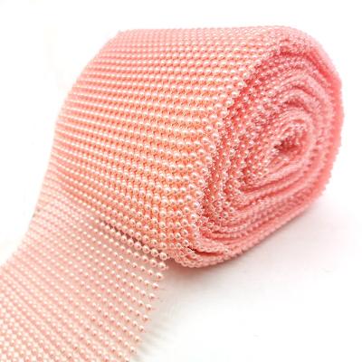 China Viable Net 24 Tiers Rhinestone Light Pink Plastic Ribbon Accessories Materials Bead Mesh For Clothes Decoration for sale