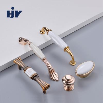 China HJY Durable Ceramic Cabinet Drawer Door Handle Gold Metal Wardrobe Door Pull Handle Ceramic Handle for sale