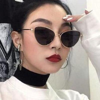 China Fashion Sunglasses 2021 Luxury Brand Metal Frame Sunglasses Shade Women's Adult Cat Eye Triangle Sunglass for sale