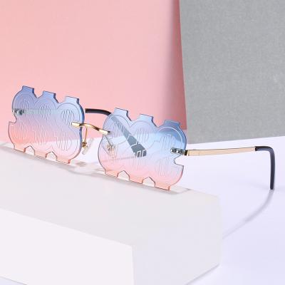 China Fashion Sunglasses New Arrival PC Lens Sunglasses Summer Metal Dollar Frameless Orange Sunglasses for sale