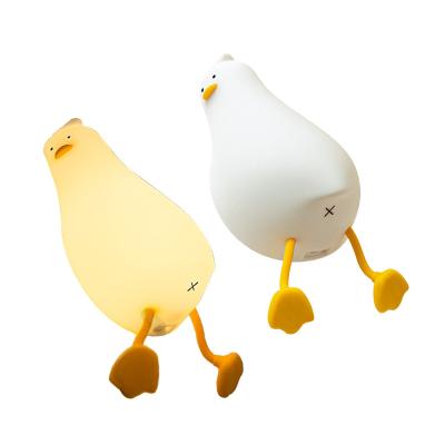 China Modern Wholesale Lying Duck Silicone Night Lamp Rechargeable Children's Sleep Lamp Bedhead Photo Atmosphere Lamp Cute for sale