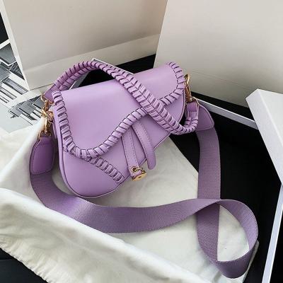 China 2022 new fashion saddle women bag one shoulder handle trend latch casual zipper PU material polyester inside lock ornament bag for sale