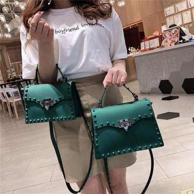 China 2022 Fashion Designer High Quality Jelly Crossbody Bags For Women PVC Rivet Leather Handbag Women Messenger Bags for sale