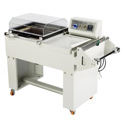 China Multifunctional Beverage Mobile Phone Box Shrink Paper Wrapping Machine for sale