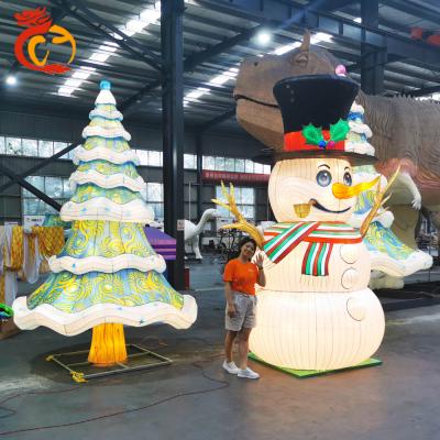 China Custom Outdoor Christmas Tree Snowman Christmas Tree Colorful Cloth Lantern Demonstration for sale