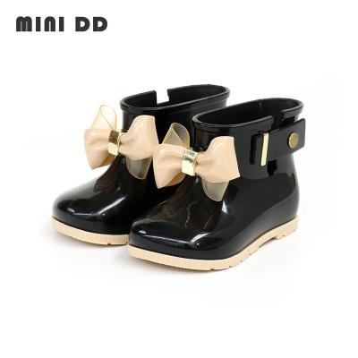 China Dual Density Waterproof MINI Kids Classic Rain Rejects Cute Girls Jelly Water Shoes Children Ankle Boots Solid Color Bow Rain Shoes for sale