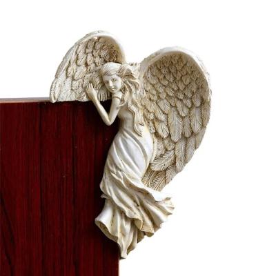 China Europe Hand-made Resin Angel Statue Fiberglass Door Frame Angel Wing Statue For Furniture Decor for sale