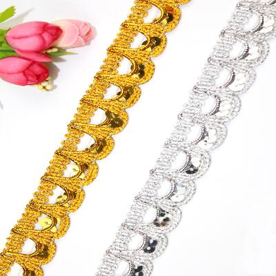 China Sewing silver sequined braided trim 23mm cheap diy diy dancewear gold textile lace U-shape polyester lace fabric curtain decoration for sale