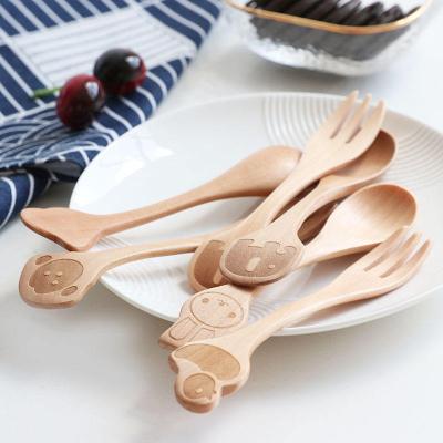 China Sustainable Hot Selling Cartoon Baby Wooden Spoon Eco-friendly Wooden Spoon And Children's Dinner Serving Tableware Fork Cutlery Made for sale