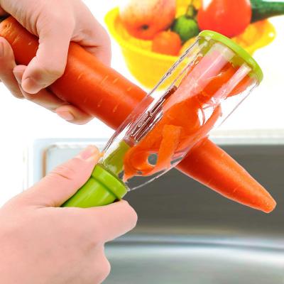 China Viable Household Stainless Steel Peeler With Multifunctional Memory Tube Anti-splash Fruit Vegetable Peeling Knife For Kitchen Instruments for sale