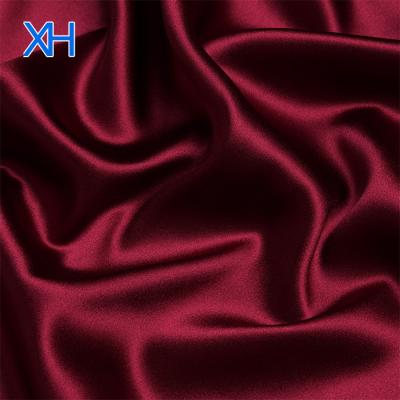 China Viable Hot Fashion Solid Ice Silk Satin Stretch Wholesale With Great Price By Xinhe Textiles for sale