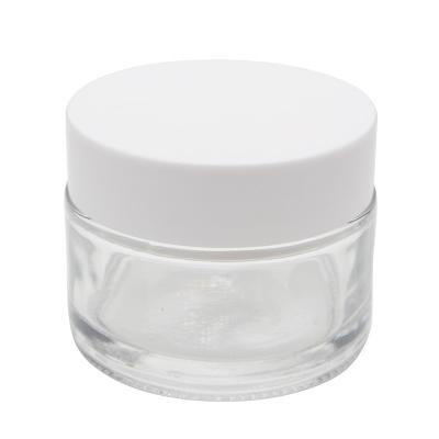 China Wholesale high quality clear empty cosmetic glass jar 50g for cream with white plastic lid for sale