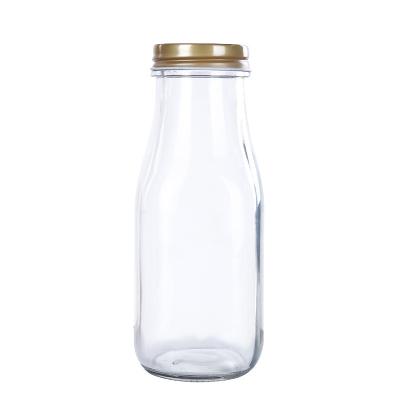 China Flavor Juice Soft Drink Soda Beverage Glass Packing Round Clear Transparent Carbonated Bottle for sale