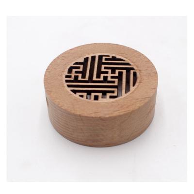 China Personal Care Carved Hollow Out Solid Wood Perfume Car Perfume Bottle Cover Solid Wood Swing Custom Solid Wood Lid Maker for sale