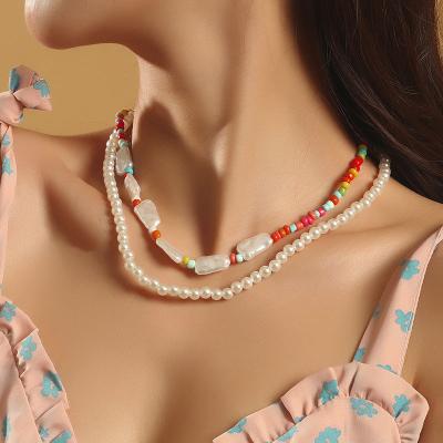 China Eco-Friendly Bohemian Handmade Multi-Layer Simple Color Pearl Beaded Necklace For Women Jewely for sale