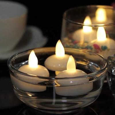 China Parties Nayun Water Activated LED Tea Light Yellow Flicker Floating LED Tealight Candle for sale