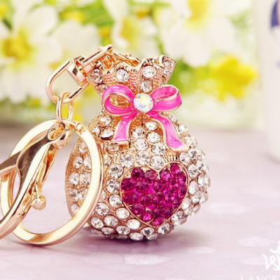 China For Beautiful Cute Decoration Crystal Money Bags Keychains Women Accessories On Bags Car Key Chain Keyrings Toy Gifts for sale