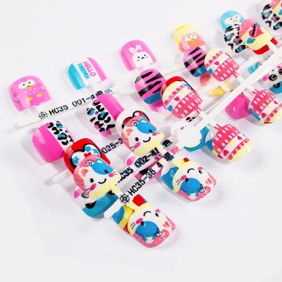 China Full Cover Factory Supply 24Pcs Kids Short Full Cover Fashionable Cute Cartoon Kids False Nails Multi Fake Nail Stickers Designs for sale