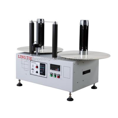 China Automatic Beverage Factory Product Antidusting Label Rewinding Machine for sale