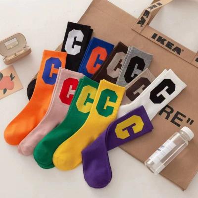 China Custom Logo Seamless Fashion Antibacterial Combed Cotton Socks Girl Sports Crew Socks for sale