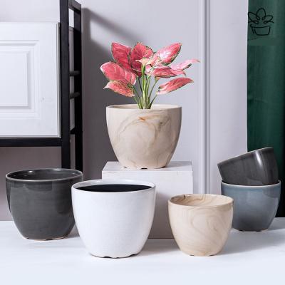 China Modern Home Balcony Customized Modern Ice Desktop Slot Around Ceramic Flowerpot for sale