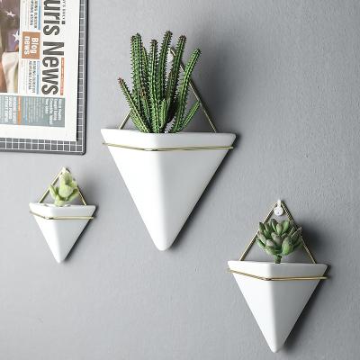 China Modern Wall Decor Ceramic Plant Hanging Pots for sale