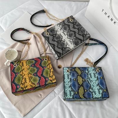 China 2021 PU Newcomers Girls Snake Skin Tote Bags Females Purses Shoulder Handbags For Young Lady for sale