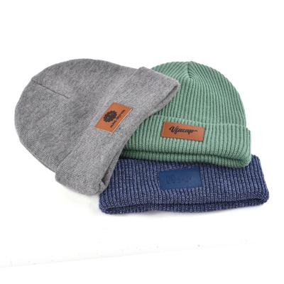 China Common Good Quality Designs Knit Hat Winter Hats Luxury Knitted Beanie Leather Custom Patch for sale