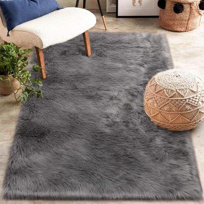 China Washable Soft Plush Living Room Bedroom Rug Soft Faux Fur Sheepskin Rug Luxury Faux Fur Carpet for sale