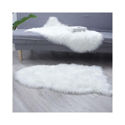 China Modern Irregular Super Soft Plush Bedroom Carpet Luxury Faux Fur Carpet For Living Room for sale