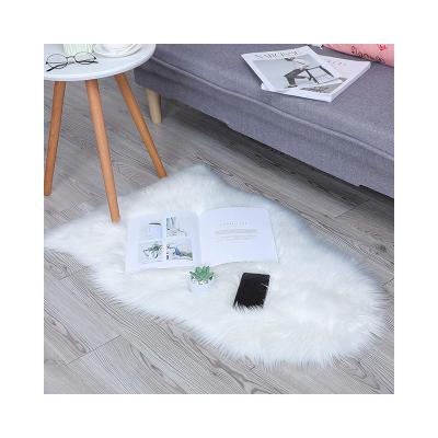 China Modern Wholesale Modern Bedroom Bedside Living Room Soft Plush Polyester Fur Flooring Carpet Blanket for sale