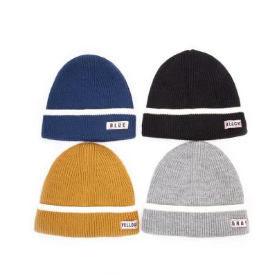 China COMMON High Quality Warm Winter Sports Acrylic Knitted Beanie Hats With Label for sale