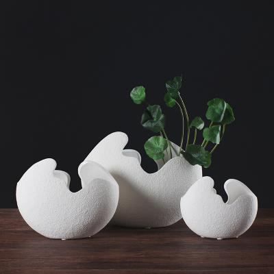 China High-grade modern minimalist creative home decoration fashion flower eggshell white ceramic vase for sale