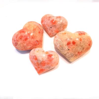 China Wholesale Natural Rare High Quality Heart Shaped Stone Sunstone Donghai Heart Shaped Sunstone Palm for Healing for sale