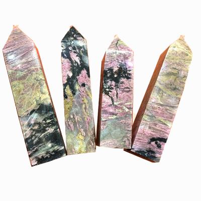 China Wholesale Natural Europe Rhodonite Quartz Tower Chakra Healing Carved Rhodonite Wand Stone Raw Point Rhodonite For Decoration for sale