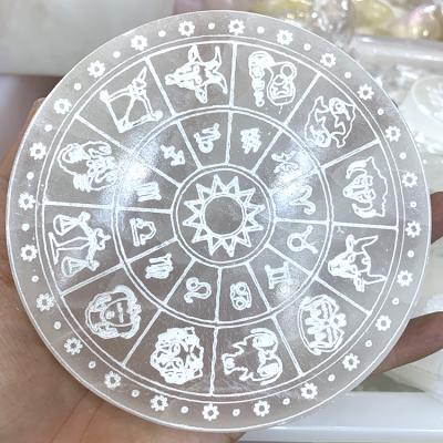 China Donghai Wholesale Natural Selenite Carved Zodiac Dish Selenite Grid Healing Flower of Life Polished Filling Dish for Meditation for sale