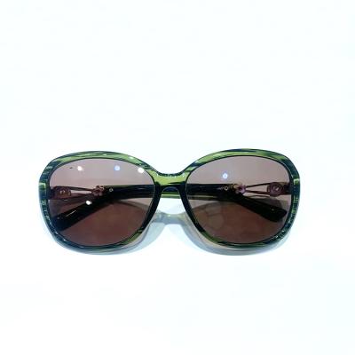 China China brand natural crystal sunglasses wholesale customizable unisex curved sunglasses with green striation frame for sale