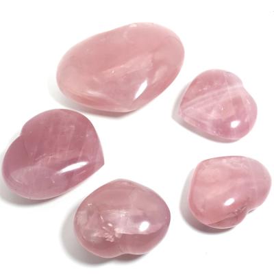 China Europe wholesale natural pink crystal hearts carving rose quartz palm heart for decoration for sale